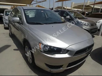 Cars For Sale Mitsubishi  Lancer  EX  125,000  Silver  Sedan  Automatic  FWD  Cloth  2015  4  No  Gasoline