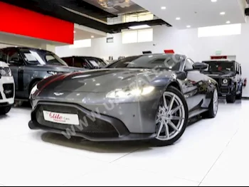 Cars For Sale Aston Martin  Vantage  67  Gray  Coupe / Sport  Automatic  RWD  Leather / Cloth  2019  8  No  Gasoline