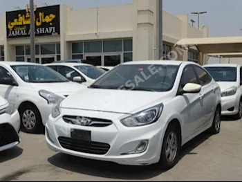 Cars For Sale Hyundai  Accent  100,000  White  Sedan  Automatic  FWD  Cloth  2015  4  No  Gasoline