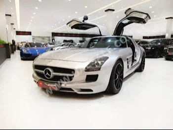 Cars For Sale Mercedes-Benz  SLS-Class  63 AMG  9,000  Silver  Coupe / Sport  Automatic  AWD  Leather  2013  8  No  Gasoline