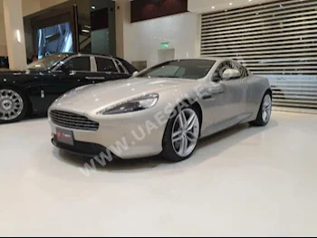 Cars For Sale Aston Martin  DB  9  14,000  Gray  Coupe / Sport  Automatic  RWD  Leather  2015  12  No  Gasoline