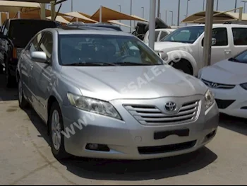Cars For Sale Toyota  Camry  GLX  140,000  Silver  Sedan  Automatic  FWD  Cloth  2009  4  Yes  Gasoline