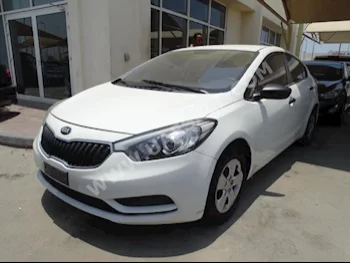 Cars For Sale Kia  Cerato  100,000  White  Sedan  Automatic  FWD  Cloth  2015  4  No  Gasoline