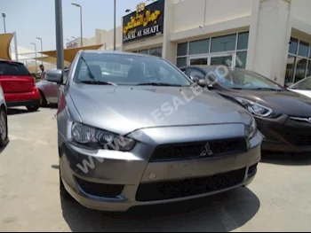 Cars For Sale Mitsubishi  Lancer  EX  130,000  Gray  Sedan  Automatic  FWD  Leather  2015  4  No  Gasoline