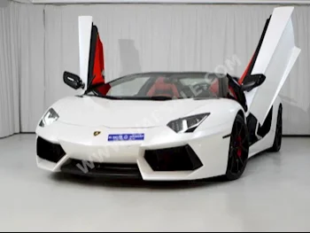 Cars For Sale Lamborghini  Aventador  Roadster  33,000  White  Convertible  F-1  AWD  Chamois  2014  12  No  Gasoline