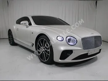Cars For Sale Bentley  Continental  GT First Edition  4,900  Off White  Coupe / Sport  Automatic  AWD  Leather  2019  12  No  Gasoline