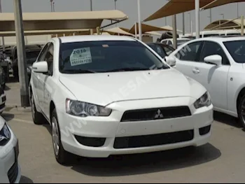 Cars For Sale Mitsubishi  Lancer  EX  87,000  White  Sedan  Automatic  FWD  Cloth  2016  4  No  Gasoline