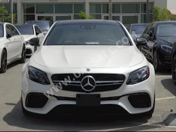 Cars For Sale Mercedes-Benz  E-Class  63 S AMG  33,000  White  Sedan  Automatic  RWD  Leather  2018  8  Panorama  Gasoline