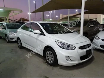 Cars For Sale Hyundai  Accent  100,000  White  Sedan  Automatic  FWD  Cloth  2016  4  No  Gasoline