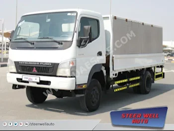 Cars For Sale Mitsubishi  Canter  98,697  White  Pick Up  Manual  4WD  Cloth  2011  4  No  Diesel