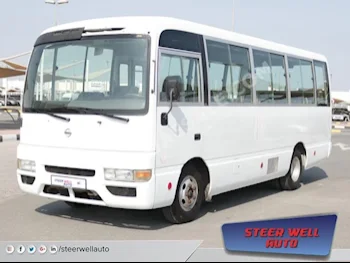 Cars For Sale Nissan  Civilian  232,619  White  Van / Bus  Manual  RWD  Cloth  2004  4  No  Diesel