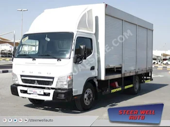 Cars For Sale Mitsubishi  Fuso Canter  73,493  White  Pick Up  Manual  RWD  Cloth  2017  4  No  Diesel