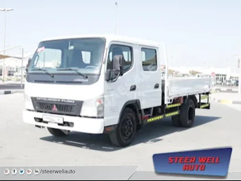 Cars For Sale Mitsubishi  Canter  245,000  White  Pick Up  Manual  RWD  Cloth  2014  4  No  Diesel
