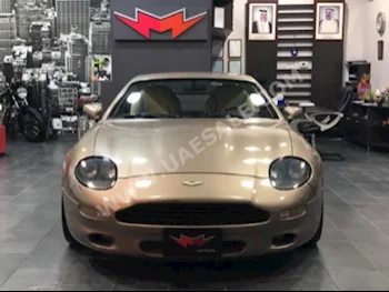 Cars For Sale Aston Martin  DB  20,000  Gold  Coupe / Sport  Automatic  RWD  Leather  1996  8  No  Gasoline