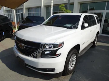 Cars For Sale Chevrolet  Tahoe  LS  109,210  White  SUV  Automatic  4WD  Cloth  2015  6  No  Gasoline