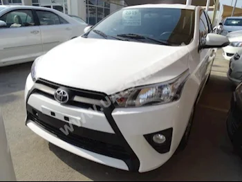 Cars For Sale Toyota  Yaris  SE  95,000  White  Hatchback  Automatic  FWD  Cloth  2015  4  No  Gasoline