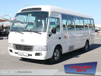Cars For Sale Toyota  Coaster  233,836  White  Van / Bus  Manual  FWD  Cloth  2014  4  No  Gasoline