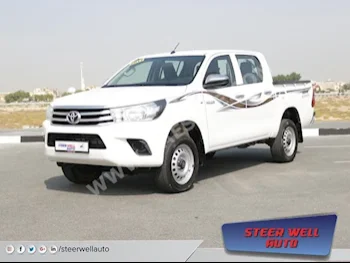 Cars For Sale Toyota  Hilux  GL  218,552  White  Pick Up  Manual  4WD  Cloth  2017  4  No  Gasoline