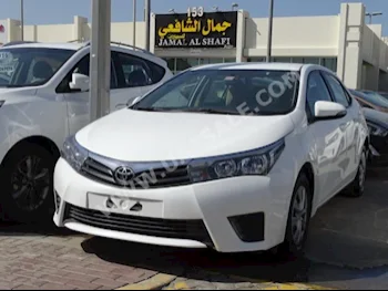 Cars For Sale Toyota  Corolla  SE  69,000  White  Sedan  Automatic  FWD  Cloth  2015  4  No  Gasoline
