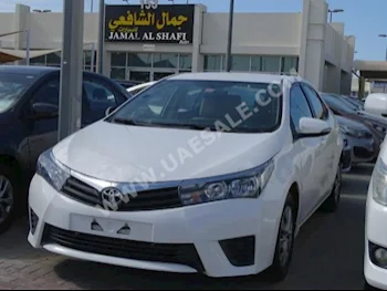 Cars For Sale Toyota  Corolla  81,000  White  Sedan  Automatic  FWD  Cloth  2015  4  No  Gasoline