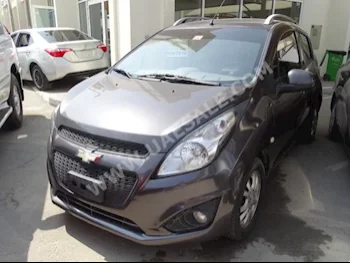 Cars For Sale Chevrolet  Spark  114,000  Dark Gray  Hatchback  Automatic  FWD  Cloth  2015  4  No  Gasoline