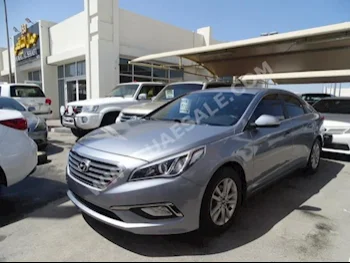 Cars For Sale Hyundai  Sonata  80,000  Silver  Sedan  Automatic  FWD  Cloth  2015  4  No  Gasoline