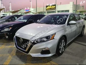 Cars For Sale Nissan  Altima  19,000  Silver  Sedan  Automatic  FWD  Cloth  2019  4  No  Gasoline