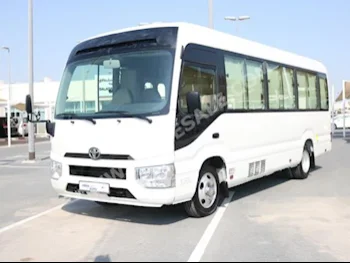 Cars For Sale Toyota Coaster 170,000 White Van / Bus Manual FWD Cloth 2017 6 No Gasoline