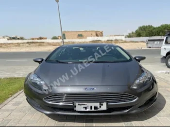 Cars For Sale Ford  Fiesta  29,505  Gold & Black  Sedan  Automatic  FWD  Cloth  2018  4  No  Gasoline