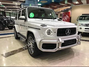 سيارات للبيع مرسيدس - بنز  جي - كلاس  63 AMG  30,000  أبيض  اس يو في  اتوماتك  دفع رباعي  جلد  2019  8  نعم  ديزل