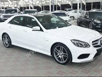 Cars For Sale Mercedes-Benz  E-Class  300 AMG  105,000  White  Sedan  Automatic  RWD  Leather  2016  4  Yes  Gasoline