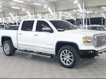 Cars For Sale GMC  Sierra  Denali  100,000  White  Pick Up  Automatic  4WD  Leather  2015  6  No  Gasoline