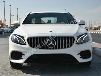 Cars For Sale Mercedes-Benz  E-Class  300  81,000  White  Sedan  Automatic  RWD  Leather  2017  4  Panorama  Gasoline