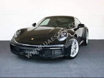 سيارات للبيع بورش  911  كاريرا  0  أسود  كوبيه \ سبورت  تبترونك  دفع خلفي  جلد  2020  6  كلا  بنزين