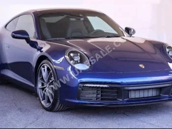 سيارات للبيع بورش  911  كاريرا  0  ازرق  كوبيه \ سبورت  تبترونك  دفع خلفي  جلد  2020  6  كلا  بنزين