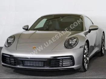 سيارات للبيع بورش  911  كاريرا  0  ذهبي  كوبيه \ سبورت  تبترونك  دفع خلفي  جلد  2020  6  كلا  بنزين