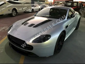 Cars For Sale Aston Martin  Vantage  S  0  Silver @blue  Coupe / Sport  Automatic  FWD  Leather  2016  12  No  Gasoline
