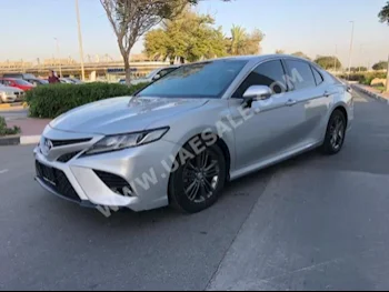 سيارات للبيع تويوتا  كامري  ال اي هايبرد  67,000  فضي  سيدان  اتوماتك  دفع أمامي  شامواه  2019  4  كلا  بنزين
