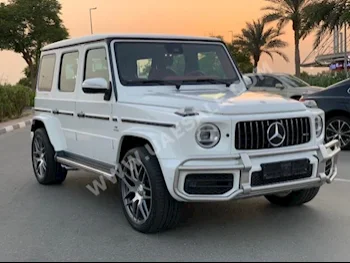 Cars For Sale Mercedes-Benz  G-Class  63 AMG  77,000  White  SUV  Automatic  4WD  Leather  2019  8  Yes  Gasoline
