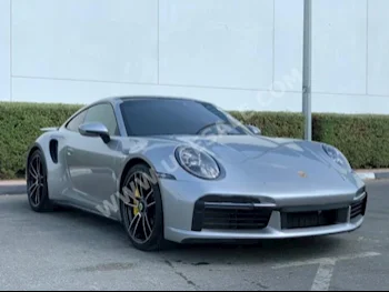 سيارات للبيع بورش  911  توربو اس  6,000  رمادي وفضي  كوبيه \ سبورت  اتوماتك  دفع خلفي  جلد  2020  8  نعم  بنزين