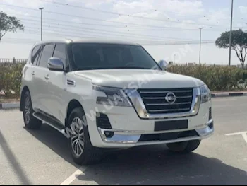 سيارات للبيع نيسان  باترول  اس اي  136,000  أبيض  اس يو في  اتوماتك  دفع رباعي  جلد  2015  8  نعم  بنزين