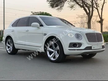 سيارات للبيع بنتلي  بينتايجا  26,000  أبيض  اس يو في  اتوماتك  دفع رباعي  جلد  2017  12  نعم  بنزين
