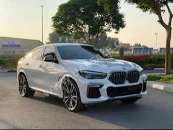 سيارات للبيع بي ام دبليو  الفئة - اكس  6 M  39,000  أبيض  اس يو في  اتوماتك  دفع خلفي  جلد  2021  8  نعم  بنزين