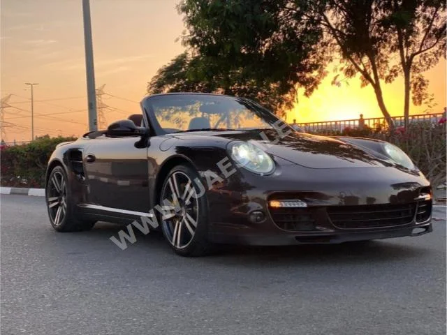 Cars For Sale Porsche  911  Carrera  103,000  Brown  Coupe / Sport  Automatic  RWD  Leather  2008  6  Yes  Gasoline