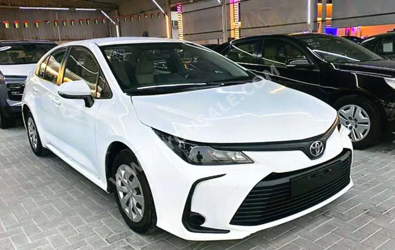 Toyota  Corolla  XLI  2020  Automatic  63,000 Km  4 Cylinder  FWD  Sedan  White  With Warranty